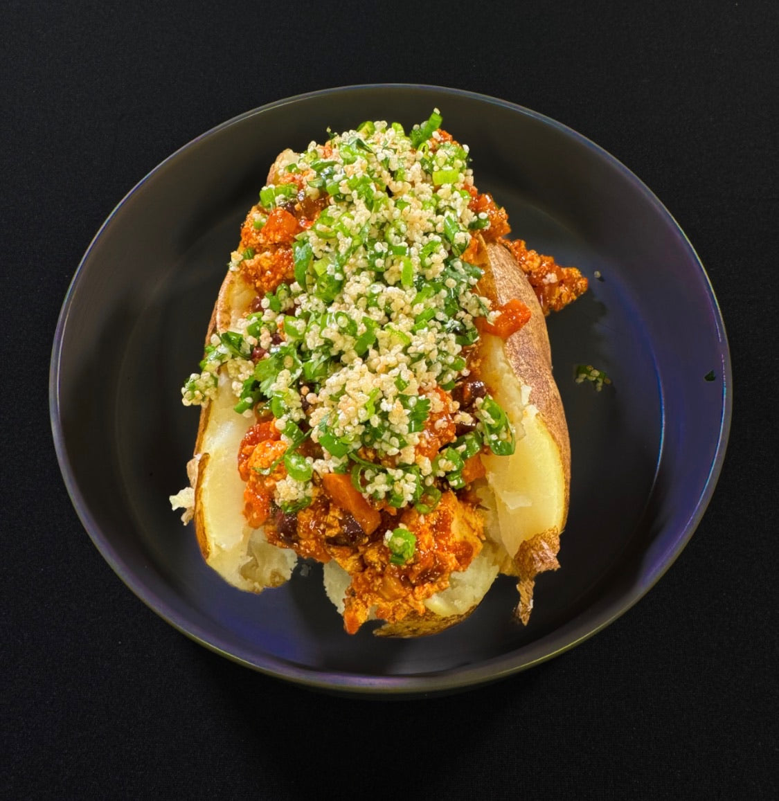 WO 9/27/26 - Vegan Chili Stuffed Potato w/ topped w/ olive oil herb breadcrumbs